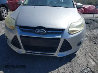 2012 Ford Focus SEL with VIN 1FAHP3H29CL114884, listed as a IAAI auction lot 41785864 with 180,095 mi miles. Bid and sale history available at carsss.com. Image 6.