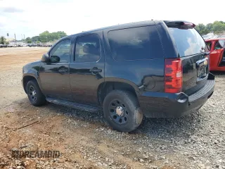 2014 Chevrolet Tahoe Commercial with VIN 1GNLC2E00ER164108, listed as a Copart auction lot 63034785 with 190,949 mi miles and Salvage title. Bid and sale history available at DreamBid. Image 2.