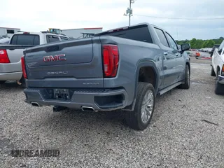 2019 GMC Sierra 1500 Denali with VIN 1GTU9FEL7KZ355632, listed as a IAAI auction lot 42487913 with 51,467 mi miles and . Bid and sale history available at DreamBid. Image 4.