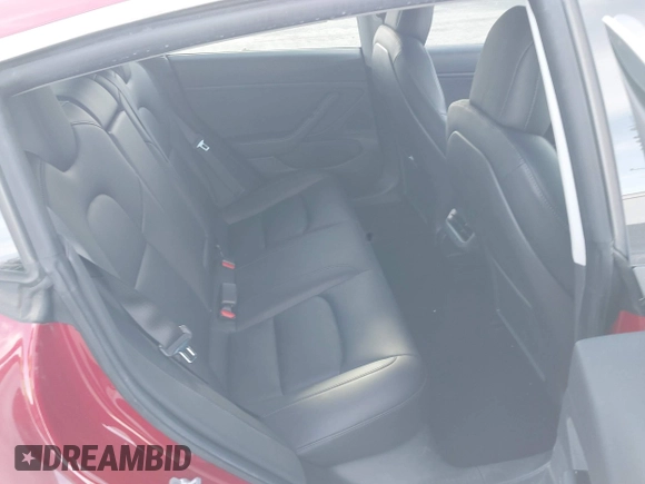 2019 Tesla Model 3 Mid Range with VIN 5YJ3E1EA3KF466418, listed as a IAAI auction lot 41724564 with 53,774 mi miles and . Bid and sale history available at DreamBid. Image 8.