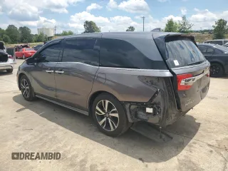 2018 Honda Odyssey Elite with VIN 5FNRL6H96JB015464, listed as a Copart auction lot 56911075 with 120,868 mi miles and Clean title. Bid and sale history available at DreamBid. Image 2.