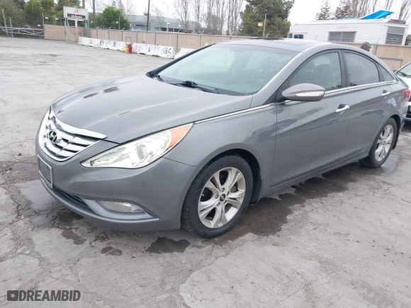 2013 Hyundai Sonata SE with VIN 5NPEC4AC0DH519040, listed as a IAAI auction lot 41934801 with 283,765 mi miles. Bid and sale history available at carsss.com. Image 2.