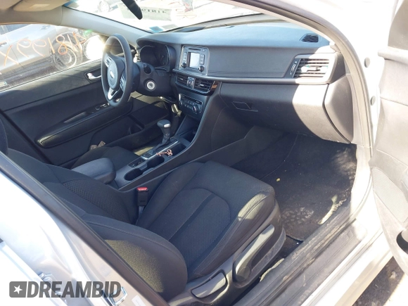2016 Kia Optima LX with VIN 5XXGT4L34GG078857, listed as a IAAI auction lot 41819971 with 112,963 mi miles. Bid and sale history available at carsss.com. Image 5.