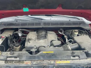 2005 Nissan Titan LE with VIN 1N6AA07B35N537476, listed as a Copart auction lot 61576665 with 189,000 mi miles and Clean title. Bid and sale history available at DreamBid. Image 7.
