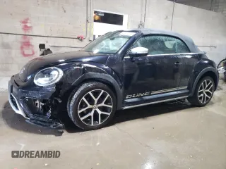 2017 Volkswagen Beetle with VIN 3VWT17AT2HM816046, listed as a Copart auction lot 77377274 with 27,948 mi miles and Salvage Title. Bid and sale history available at DreamBid. Image 1.