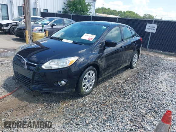 2012 Ford Focus SE with VIN 1FAHP3F21CL390012, listed as a IAAI auction lot 42634521 with 214,617 mi miles and . Bid and sale history available at DreamBid. Image 2.