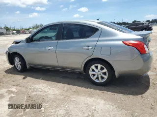 2013 Nissan Versa SV with VIN 3N1CN7AP8DL887524, listed as a Copart auction lot 61594045 with 92,094 mi miles and Salvage title. Bid and sale history available at DreamBid. Image 2.