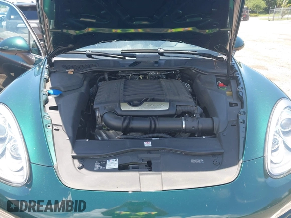 2014 Porsche Cayenne with VIN WP1AA2A21ELA06570, listed as a IAAI auction lot 42473298 with 61,421 mi miles and . Bid and sale history available at DreamBid. Image 10.