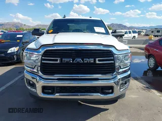 2021 Ram 2500 Big Horn with VIN 3C6UR5DL1MG676863, listed as a IAAI auction lot 42386260 with 105,328 mi miles and . Bid and sale history available at DreamBid. Image 13.
