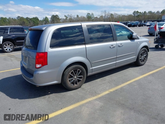 2014 Dodge Grand Caravan SXT with VIN 2C4RDGCGXER261467, listed as a IAAI auction lot 41801810 with 97,322 mi miles and . Bid and sale history available at DreamBid. Image 4.