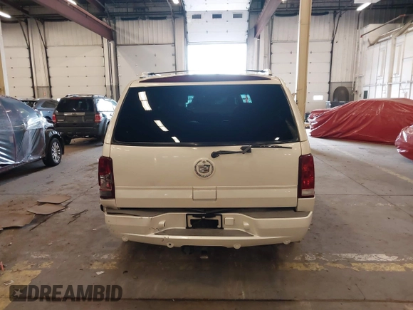 2003 Cadillac Escalade z VIN 1GYEK63N53R162632, wystawiony jako IAAI lot #41542627 z przebiegiem 147 577 mil mil oraz . Historia ofert i sprzedaży dostępna na DreamBid. Obrazek 16.