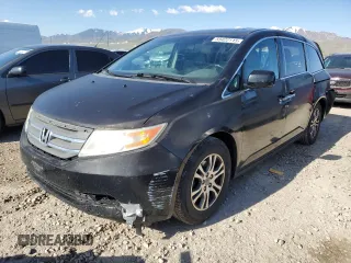 2012 Honda Odyssey EX-L with VIN 5FNRL5H69CB141594, listed as a Copart auction lot 55422115 with 181,745 mi miles and Salvage Title. Bid and sale history available at DreamBid. Image 1.