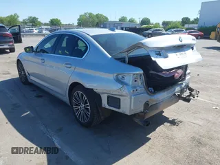 2019 BMW 5 Series 530i with VIN WBAJA5C5XKWW07106, listed as a IAAI auction lot 41977982 with 65,371 mi miles and . Bid and sale history available at carsss.com. Image 3.