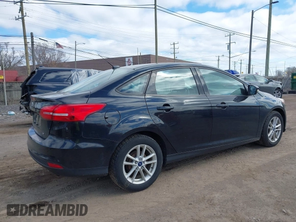 2017 Ford Focus SE with VIN 1FADP3F2XHL263071, listed as a IAAI auction lot 42046106 with 91,633 mi miles and . Bid and sale history available at DreamBid. Image 4.