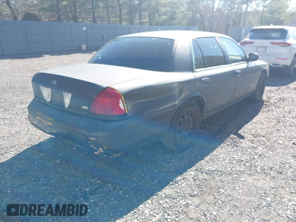 2011 Ford Crown Victoria with VIN 2FABP7AV9BX121739, listed as a IAAI auction lot 41763311 with 215,727 mi miles. Bid and sale history available at carsss.com. Image 4.