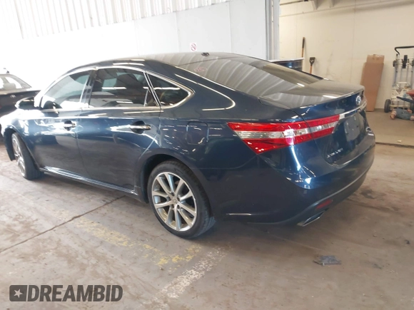 2014 Toyota Avalon Limited with VIN 4T1BK1EB1EU128987, listed as a IAAI auction lot 42034677 with 104,153 mi miles and . Bid and sale history available at DreamBid. Image 3.