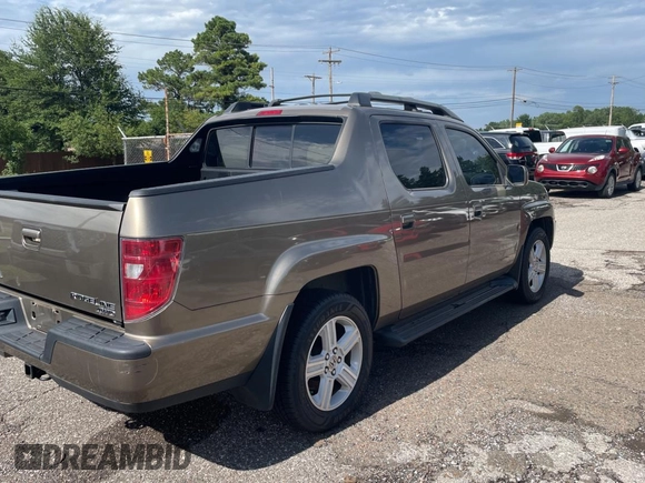 2009 Honda Ridgeline RTL with VIN 2HJYK16539H500759, listed as a Copart auction lot 63874225 with 123,508 mi miles and Clean title. Bid and sale history available at DreamBid. Image 4.