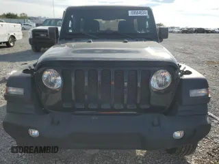 2023 Jeep Wrangler Sport with VIN 1C4HJXDN7PW530536, listed as a Copart auction lot 69664634 with 16,816 mi miles and Salvage Title. Bid and sale history available at DreamBid. Image 5.