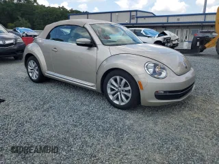 2015 Volkswagen Beetle with VIN 3VW5A7AT9FM815899, listed as a Copart auction lot 63074125 with 77,214 mi miles and Salvage title. Bid and sale history available at DreamBid. Image 4.