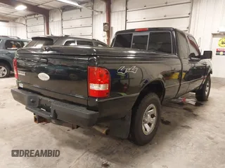 2009 Ford Ranger XLT with VIN 1FTZR45E79PA63934, listed as a IAAI auction lot 41441326 with 153,140 mi miles. Bid and sale history available at carsss.com. Image 4.