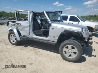 2007 Jeep Wrangler Unlimited Sahara with VIN 1J4GA59147L207482, listed as a Copart auction lot 55666615 with 151,525 mi miles and Salvage title. Bid and sale history available at DreamBid. Image 4.