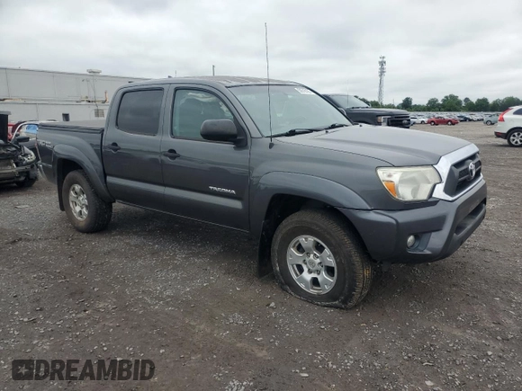 2015 Toyota Tacoma with VIN 3TMLU4EN6FM203591, listed as a Copart auction lot 58518185 with 149,729 mi miles and Salvage title. Bid and sale history available at DreamBid. Image 4.