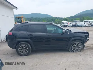 2021 Jeep Cherokee Trailhawk with VIN 1C4PJMBX0MD167941, listed as a IAAI auction lot 42507379 with 70,414 mi miles and . Bid and sale history available at DreamBid. Image 14.