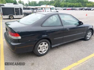 1999 Honda Civic EX z VIN 1HGEJ8241XL068738, wystawiony jako IAAI lot #42568778 z przebiegiem 202 590 mil mil oraz . Historia ofert i sprzedaży dostępna na DreamBid. Obrazek 4.