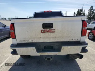 2015 GMC Sierra 2500HD available WiFi Denali with VIN 1GT120E80FF659215, listed as a Copart auction lot 48356455 with 134,796 mi miles and Salvage Title. Bid and sale history available at carsss.com. Image 6.