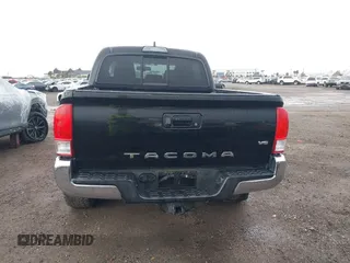2017 Toyota Tacoma SR5 with VIN 5TFAZ5CN2HX040954, listed as a IAAI auction lot 41733137 with 97,780 mi miles and . Bid and sale history available at DreamBid. Image 16.