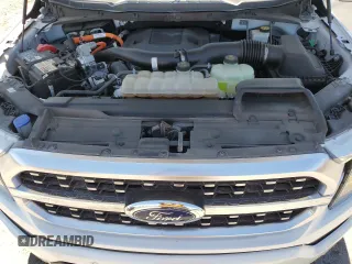 2021 Ford F-150 XL with VIN 1FTFW1CD7MFA89727, listed as a Copart auction lot 58373395 with 43,757 mi miles and Salvage title. Bid and sale history available at DreamBid. Image 11.