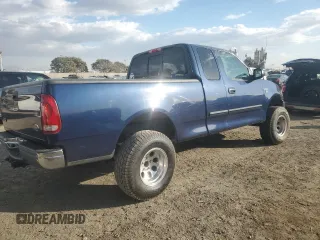 2003 Ford F-150 XL with VIN 1FTRX17L13NA95202, listed as a Copart auction lot 87766385 with 124,961 mi miles and Salvage Title. Bid and sale history available at carsss.com. Image 3.