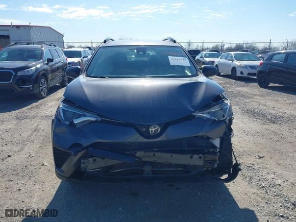 2018 Toyota RAV4 LE with VIN JTMBFREV8JJ208977, listed as a IAAI auction lot 41885547 with 66,263 mi miles. Bid and sale history available at carsss.com. Image 12.