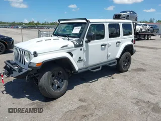 2023 Jeep Wrangler Willys with VIN 1C4HJXDN1PW546425, listed as a IAAI auction lot 42503380 with 25,245 mi miles and . Bid and sale history available at DreamBid. Image 2.
