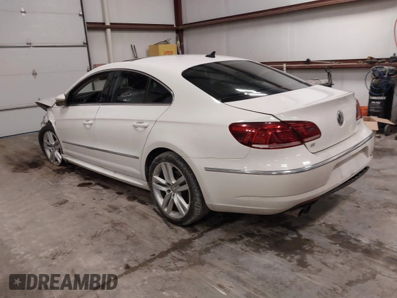 2014 Volkswagen CC Lux with VIN WVWRP7AN9EE519502, listed as a IAAI auction lot 41458158 with 85,988 mi miles. Bid and sale history available at carsss.com. Image 3.