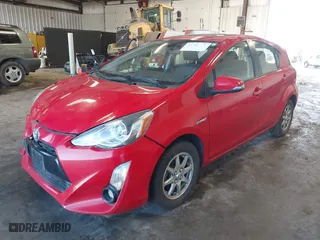 2015 Toyota Prius c One with VIN JTDKDTB3XF1108456, listed as a IAAI auction lot 41743379 with 132,265 mi miles. Bid and sale history available at carsss.com. Image 2.