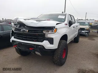 2024 Chevrolet Silverado 1500 LT Trail Boss with VIN 3GCUDFE81RG231196, listed as a IAAI auction lot 41242013 with 14,747 mi miles. Bid and sale history available at carsss.com. Image 2.