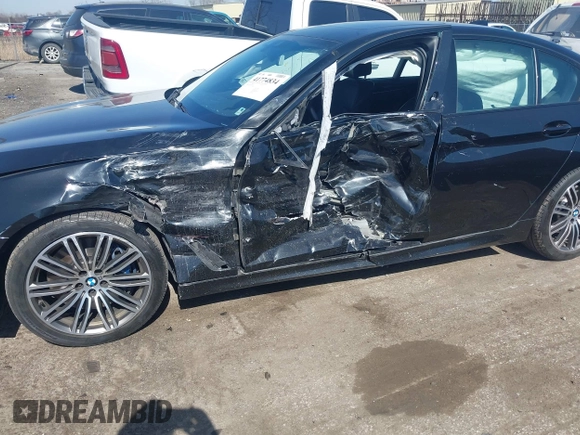 2019 BMW 5 Series M550i xDrive with VIN WBAJB9C51KB464879, listed as a IAAI auction lot 41774834 with 77,379 mi miles and . Bid and sale history available at DreamBid. Image 6.