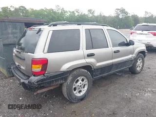 1999 Jeep Grand Cherokee Laredo with VIN 1J4G258SXXC518647, listed as a IAAI auction lot 42124724 with 229,668 mi miles and . Bid and sale history available at DreamBid. Image 4.