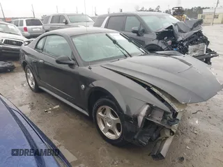 2004 Ford Mustang Standard z VIN 1FAFP40414F105171, wystawiony jako IAAI lot #41754232 z przebiegiem Nie podano mil oraz . Historia ofert i sprzedaży dostępna na DreamBid. Obrazek 13.
