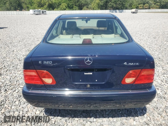 1998 Mercedes-Benz E with VIN WDBJF82F4WX012153, listed as a Copart auction lot 51848665 with 121,867 mi miles and Salvage Title. Bid and sale history available at DreamBid. Image 6.