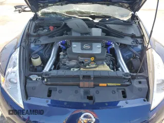 2016 Nissan 370Z z VIN JN1AZ4EH9GM933658, wystawiony jako Copart lot #48760215 z przebiegiem 70 682 mil mil oraz Szkoda całkowita • Salvage title. Historia ofert i sprzedaży dostępna na DreamBid. Obrazek 12.