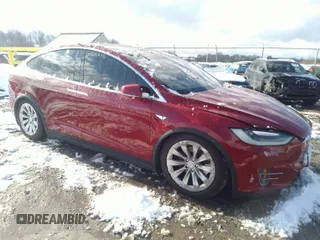 2016 Tesla Model X 70D with VIN 5YJXCAE24GF017157, listed as a IAAI auction lot 40968275 with 100,403 mi miles. Bid and sale history available at carsss.com. Image 1.