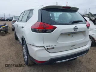 2018 Nissan Rogue SV with VIN KNMAT2MT5JP521736, listed as a IAAI auction lot 41804093 with 132,889 mi miles and . Bid and sale history available at DreamBid. Image 3.