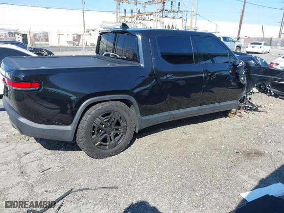 2022 Rivian R1T Launch Edition with VIN 7FCTGAAL1NN010340, listed as a IAAI auction lot 41656762 with 0 mi miles. Bid and sale history available at carsss.com. Image 4.