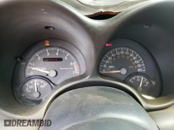 1999 Pontiac Grand Am z VIN 1G2NE12E3XM901263, wystawiony jako Copart lot #55723445 z przebiegiem 163 946 mil mil oraz Szkoda całkowita • Salvage title. Historia ofert i sprzedaży dostępna na DreamBid. Obrazek 9.