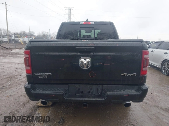 2021 Ram 1500 Laramie with VIN 1C6SRFJT6MN580803, listed as a IAAI auction lot 41207914 with 56,891 mi miles and . Bid and sale history available at DreamBid. Image 17.