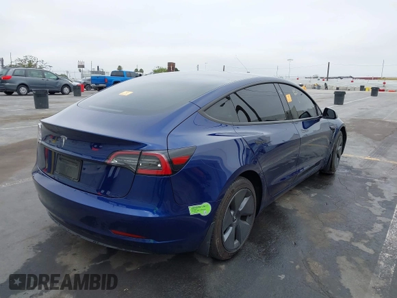 2023 Tesla Model 3 z VIN 5YJ3E1EA0PF481160, wystawiony jako IAAI lot #42704086 z przebiegiem 23 308 mil mil oraz . Historia ofert i sprzedaży dostępna na DreamBid. Obrazek 4.