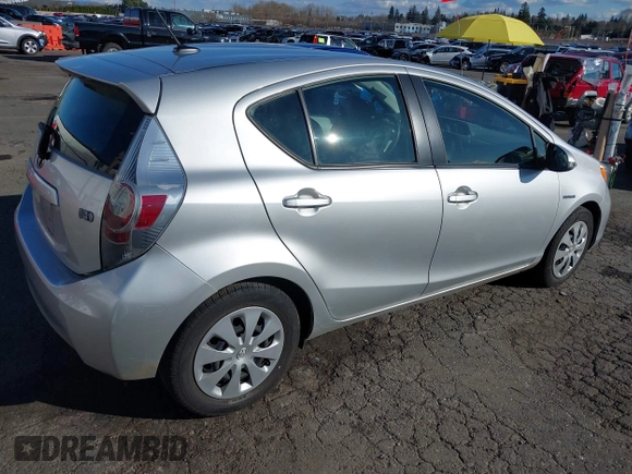 2014 Toyota Prius One z VIN JTDKDTB32E1574607, wystawiony jako IAAI lot #41724312 z przebiegiem 102 612 mil mil oraz . Historia ofert i sprzedaży dostępna na DreamBid. Obrazek 4.