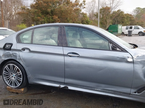 2018 BMW 5 Series 540i xDrive with VIN WBAJE7C52JWC57407, listed as a IAAI auction lot 41805890 with 112,151 mi miles and . Bid and sale history available at DreamBid. Image 13.
